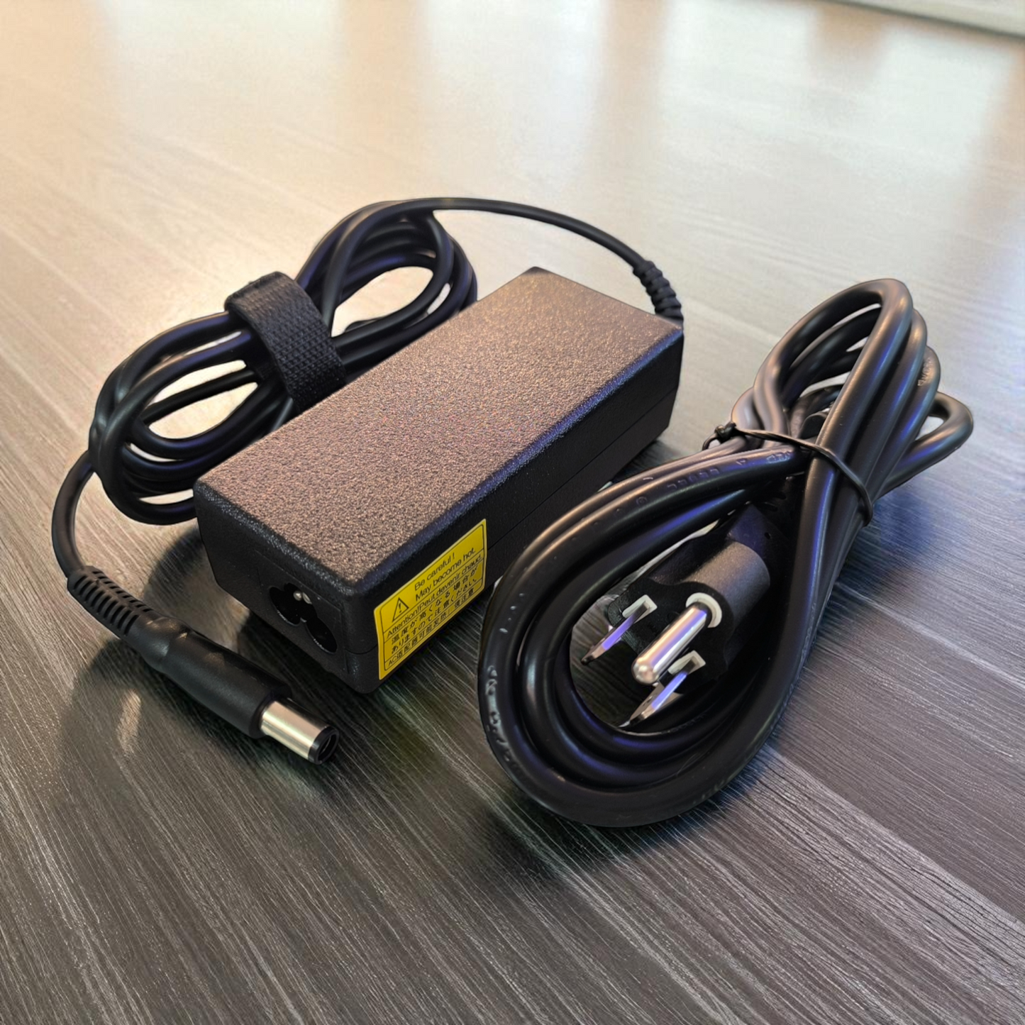 Cargador para portátil 65W 19.5V 3.34A compacto con protección inteligente contra sobrevoltaje y sobrecarga