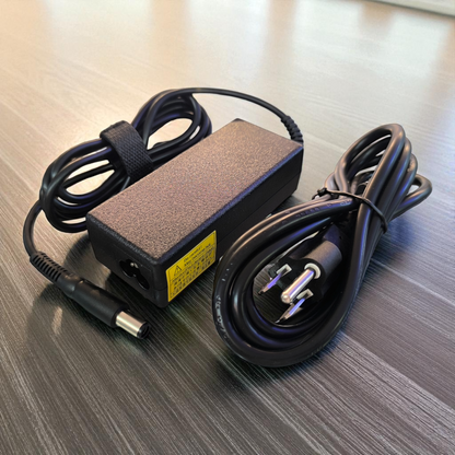 Cargador para portátil 65W 19.5V 3.34A compacto con protección inteligente contra sobrevoltaje y sobrecarga